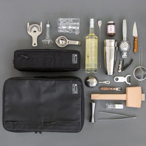Overhaed view of the HEX x Tilit Bartender Backpack, showing all the bar tending accessories that can be stored inside.