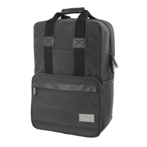Front view of the Hex Supply Convertible Backpack, charcoal, showing the accessory zipper pocket and carry handle