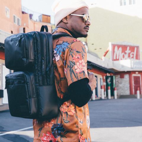 Man wearing black HEX Nero Patrol Backpack