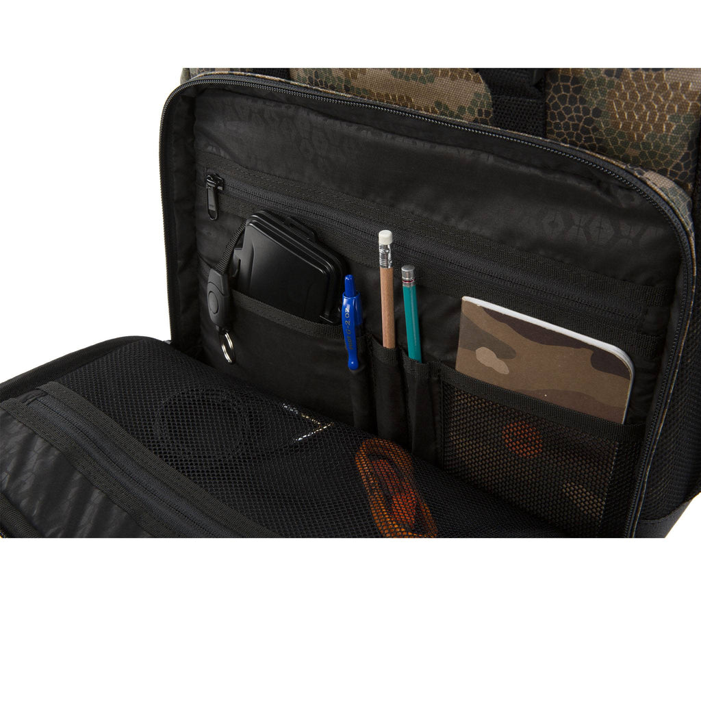 HEX x Rory Kramer Cinema Backpack, camo pattern, unzipped to show multiple interior storage pockets