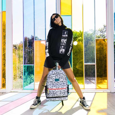 Woman holding HEX x Jasper Wong Wet/Dry Backpack